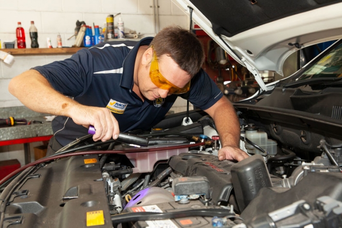 electrical mechanic under car hood providing auto electrical services sunshine coast