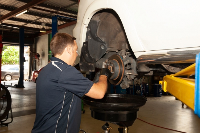 mechanic working on brake repairs sunshine coast