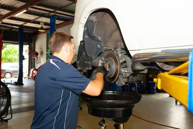 mechanic doing brake repairs sunshine coast