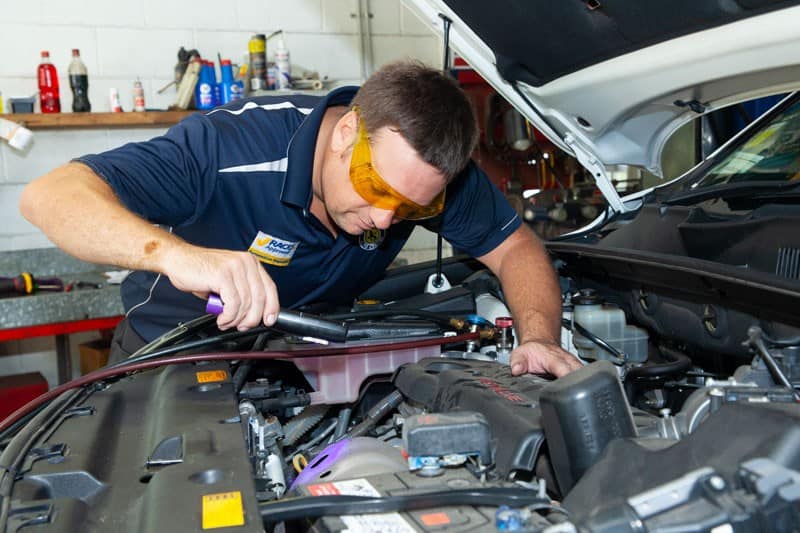 automotive specialist electrical mechanic under car hood providing auto electrical services in nambour